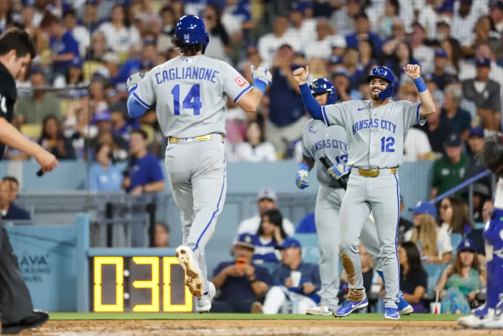 The Kansas City Royals’ Jac Caglianone, left, is greeted by...