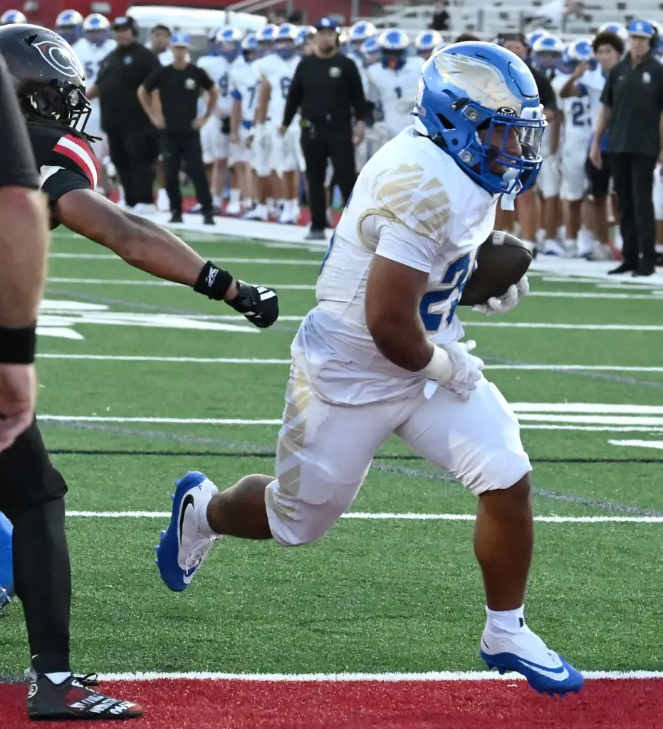 Santa Margarita running back Adrian Petero (26) runs for a...