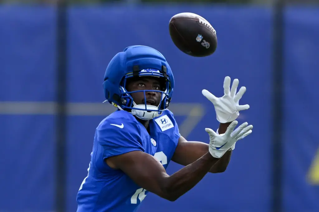 Rams wide receiver Tru Edwards catches a pass during the...