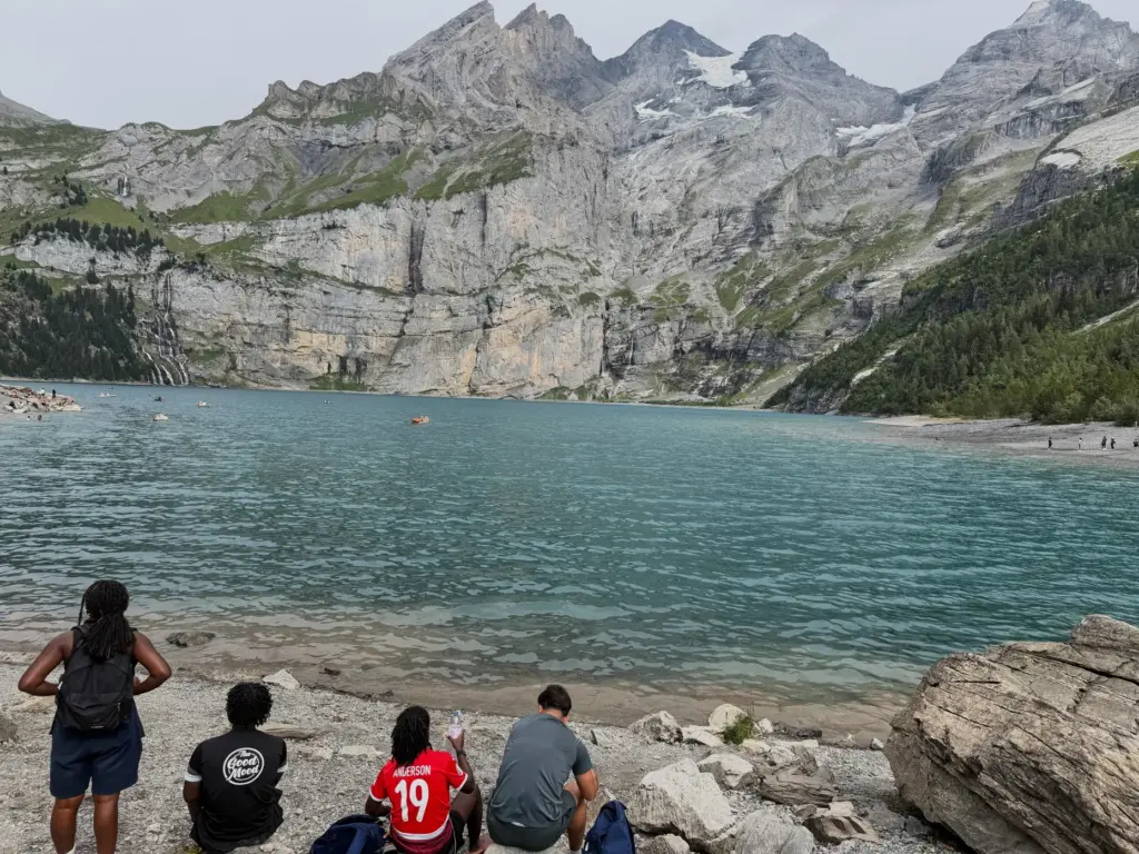 Tourists gather at the Oeschinensee lake near Kandersteg, Switzerland, Tuesday,...