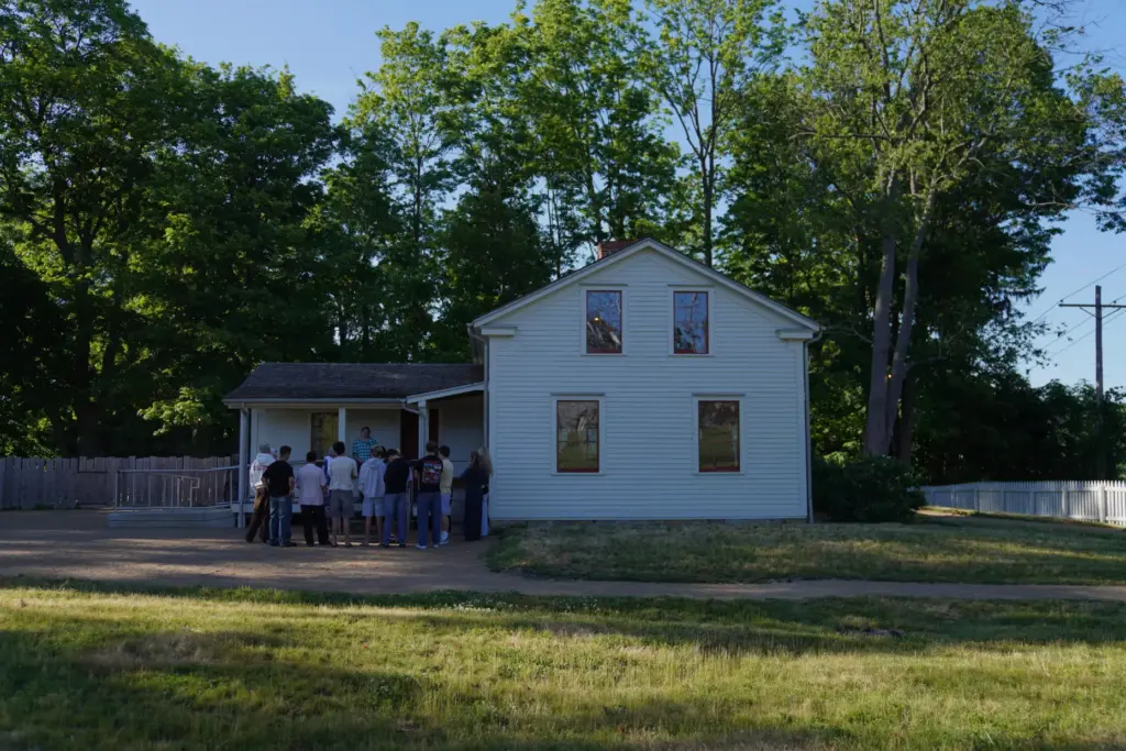 Visitors tour the Joseph and Emma Smith home while at...