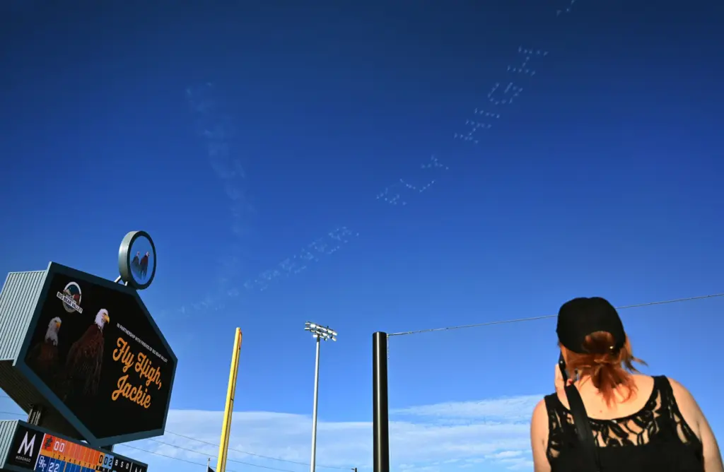 Aerial messages reading “Fly High Jackieâ, and other tributes were...