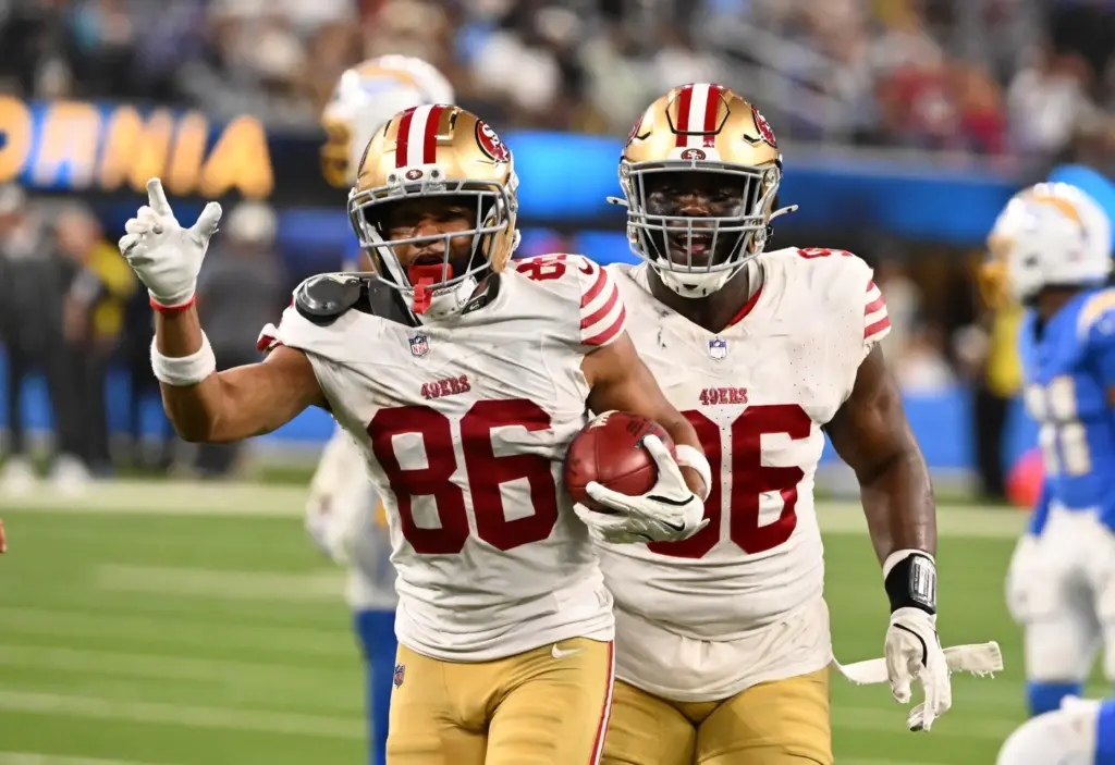 San Francisco 49ers wide receiver Junior Bergen, left, celebrates after...
