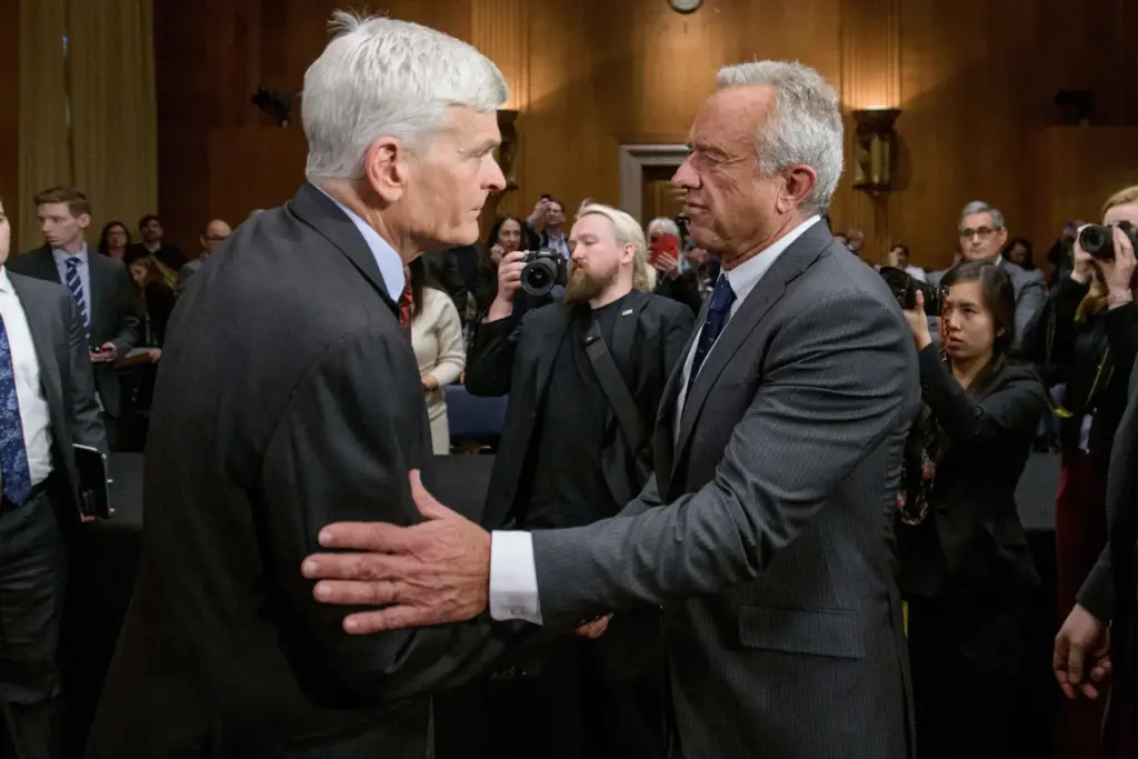 Robert F. Kennedy Jr. talks with Committee Chairman Sen. Bill Cassidy, R-La.