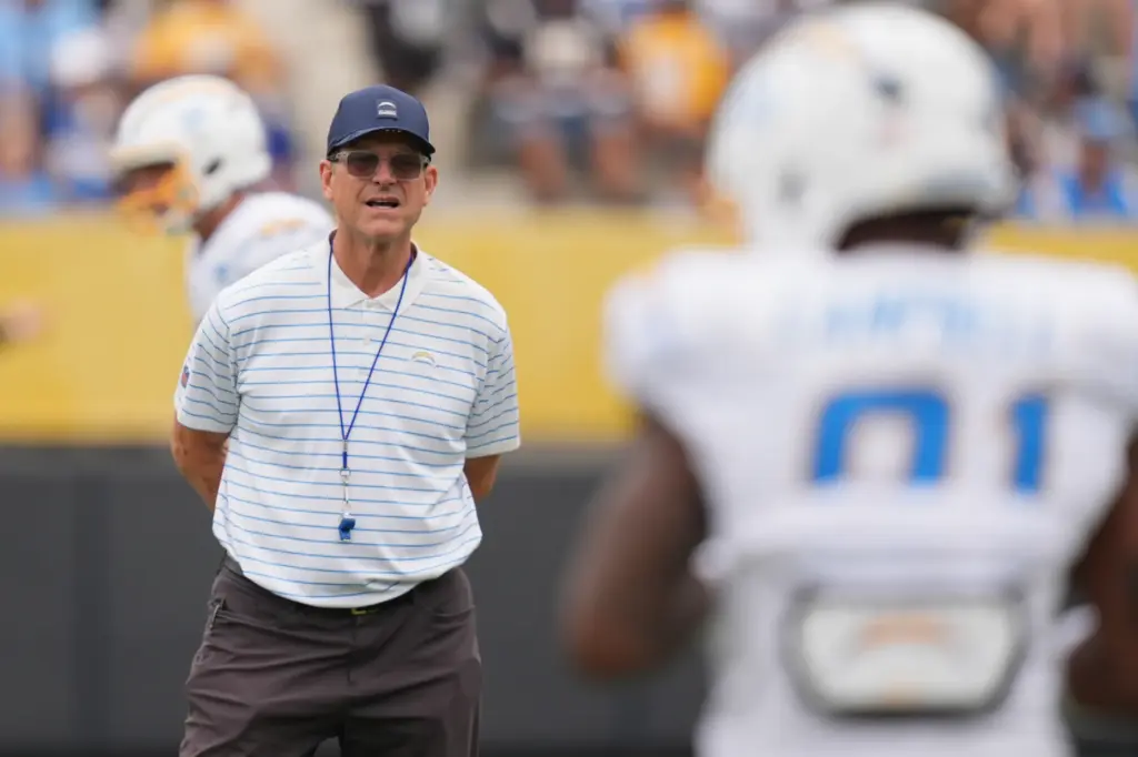 Chargers head coach Jim Harbaugh looks on during an NFL...