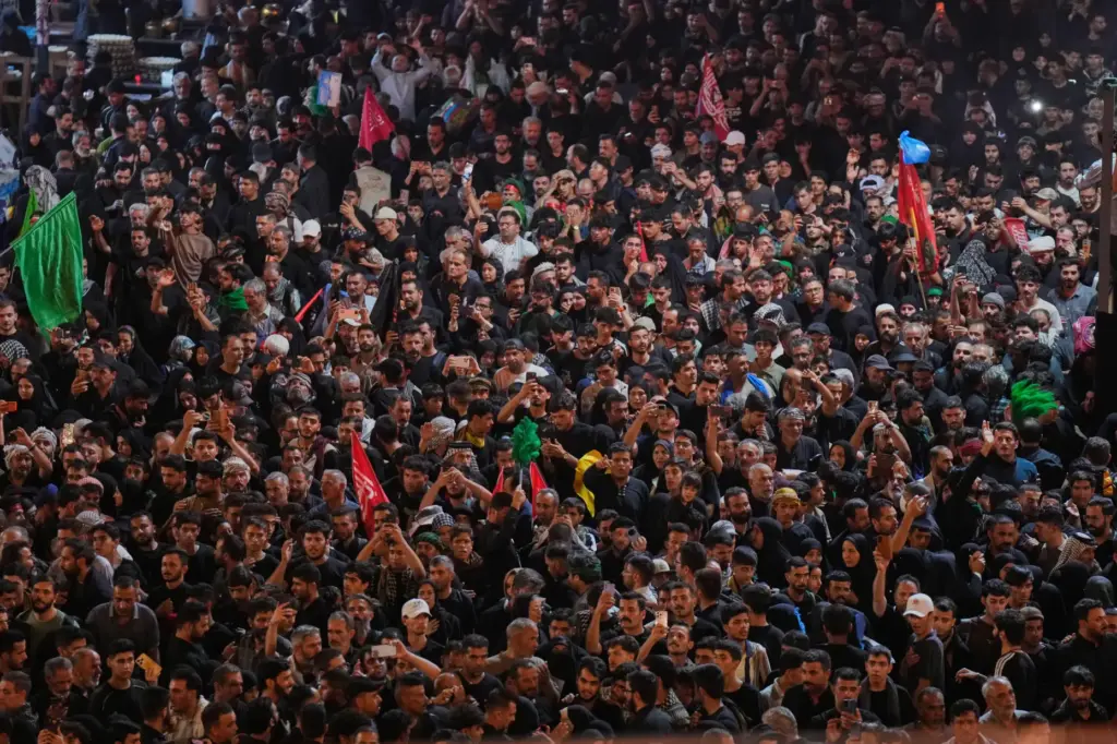 Shiite worshippers gather between the holy shrines of Imam Hussein and Imam Abbas.