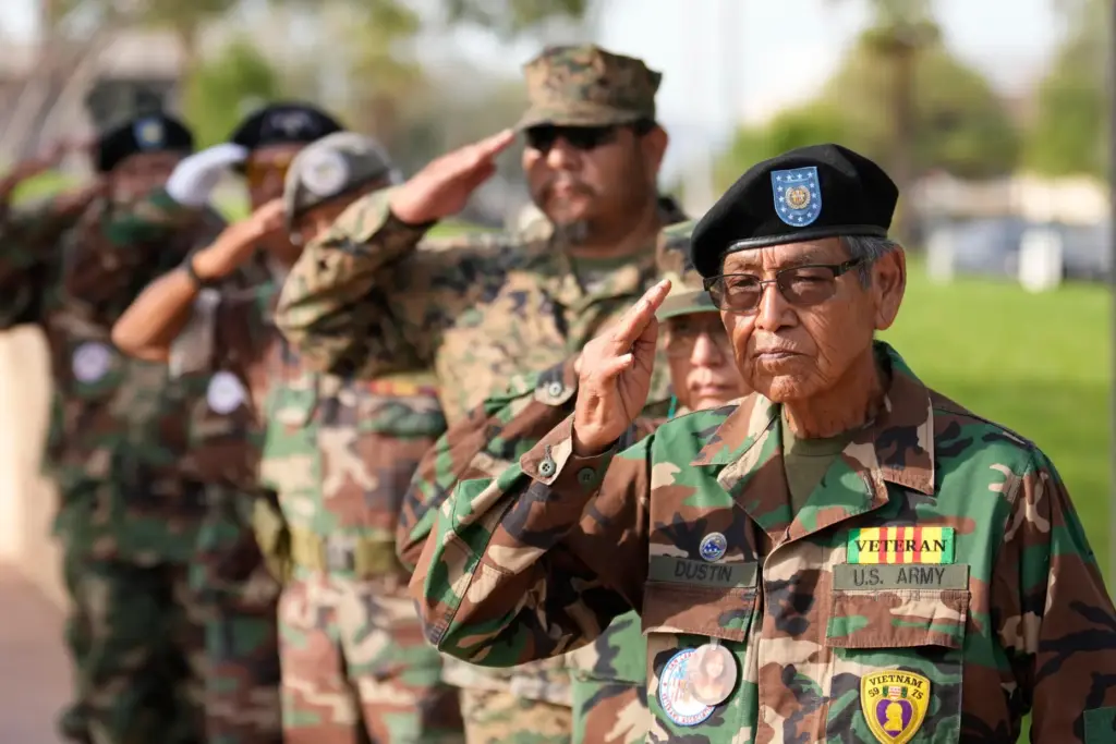 Members of the San Carlos Apache Veterans Association take part...