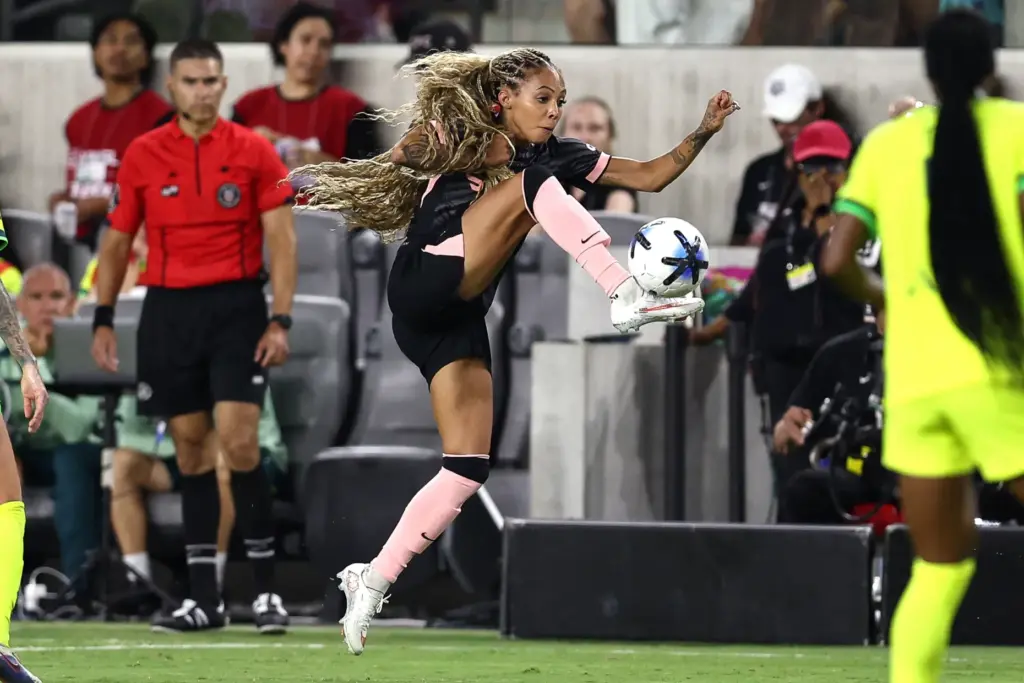 Angel City FC forward Sydney Leroux recovers the ball against...