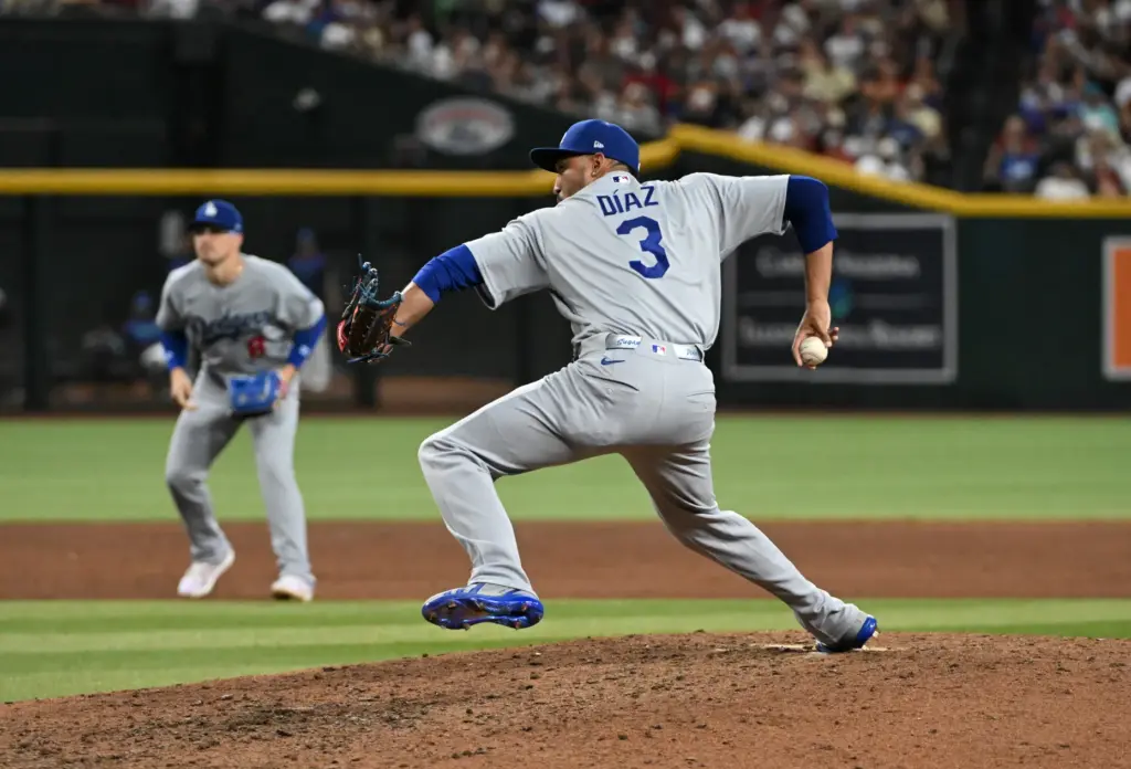 Dodgers relief pitcher Edwin Diaz throws to the plate during...