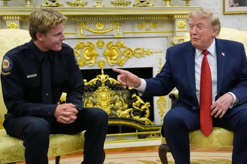 President Donald Trump speaks as he meets with lifeguard Ryder...