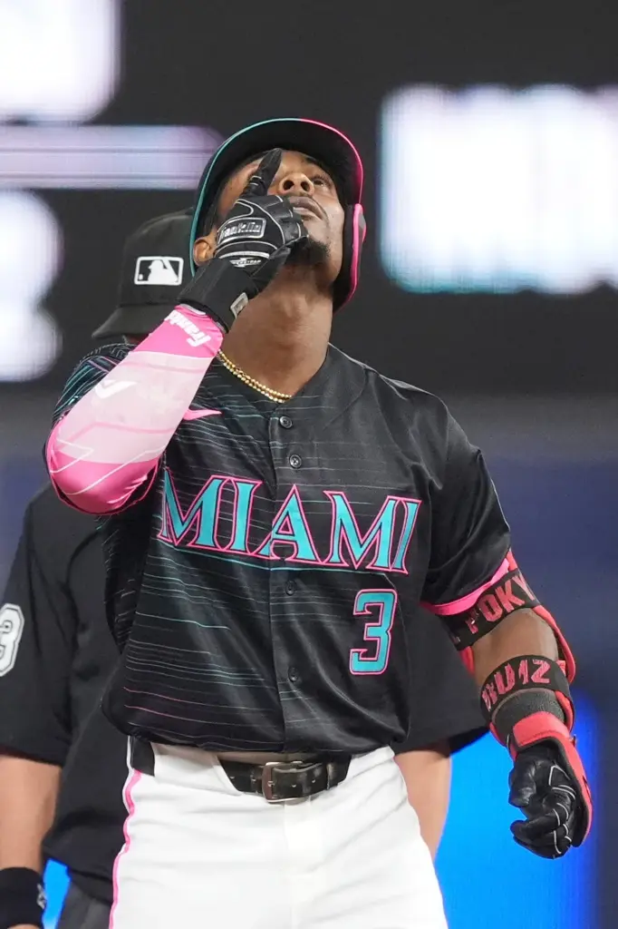 The Miami Marlins’ Esteury Ruiz celebrates on second base after...