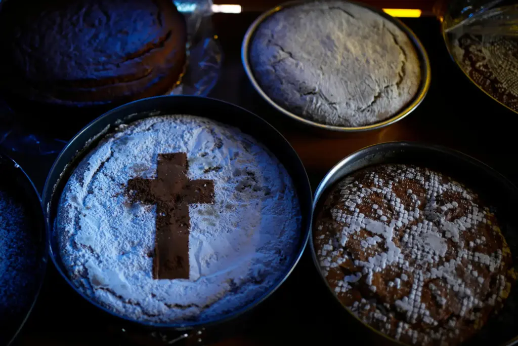 Fanouropites, orange-flavored cakes, are placed on tables to be blessed.
