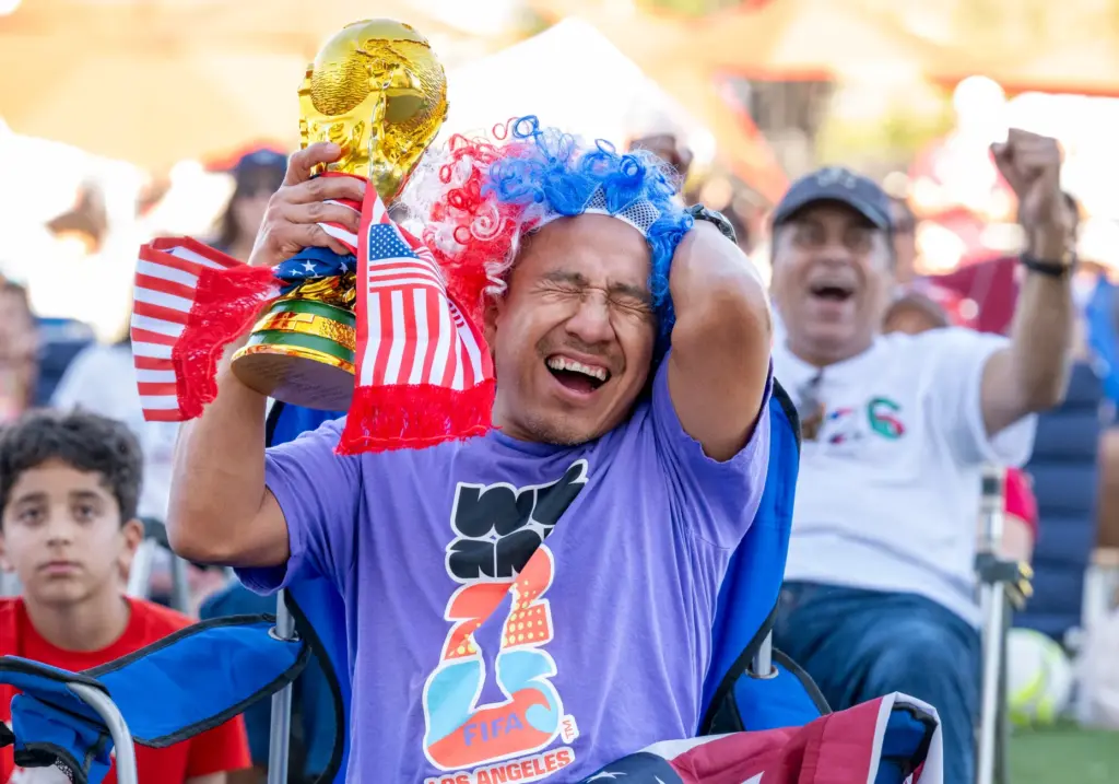 Juan Rodriguez, left, of Lake Forest reacts after watching Belgium...