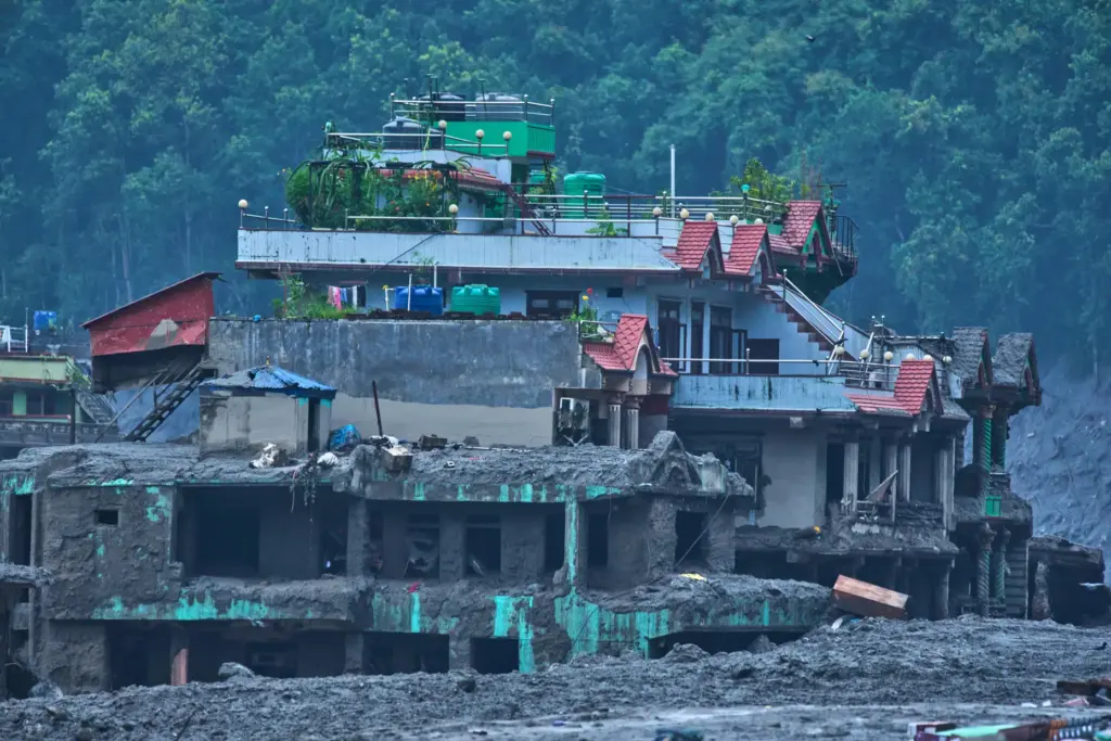 Damage is seen in the aftermath of flash floods in...