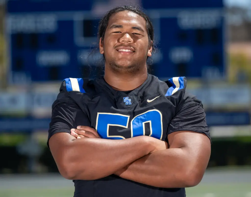Adam Iloilo (#50), left tackle at Santa Margarita Catholic High...