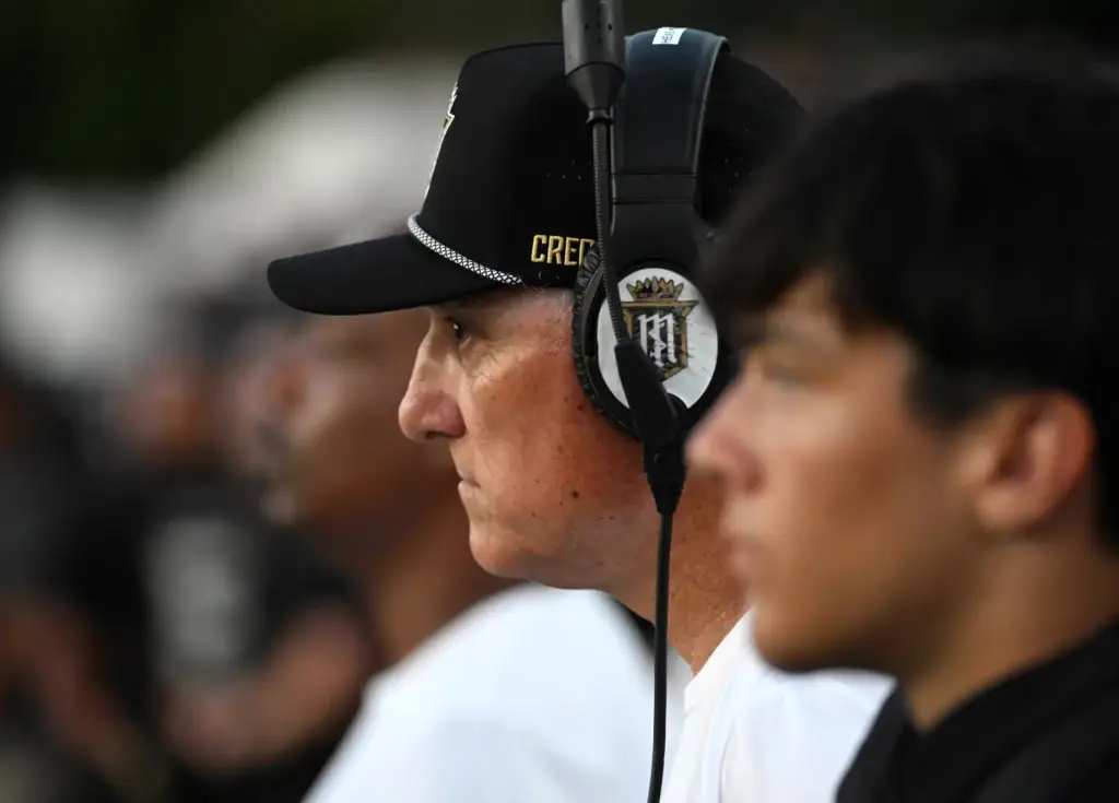 Servite’s new head coach Rick Garretson at a football game...