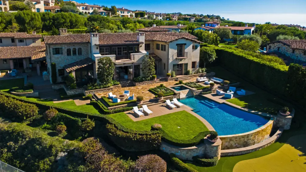A 12,347-square-foot Tuscan farmhouse-style estate in Newport Coast’s Crystal Cove...