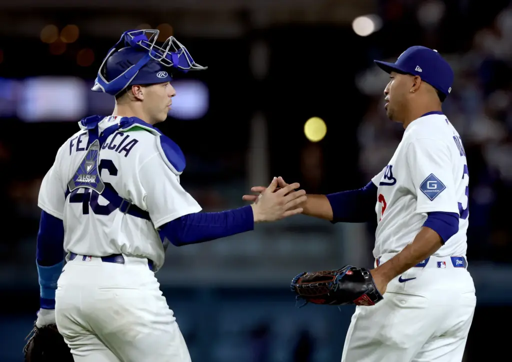 Dodgers relief pitcher Edwin Diaz, right, celebrates with catcher Hunter...