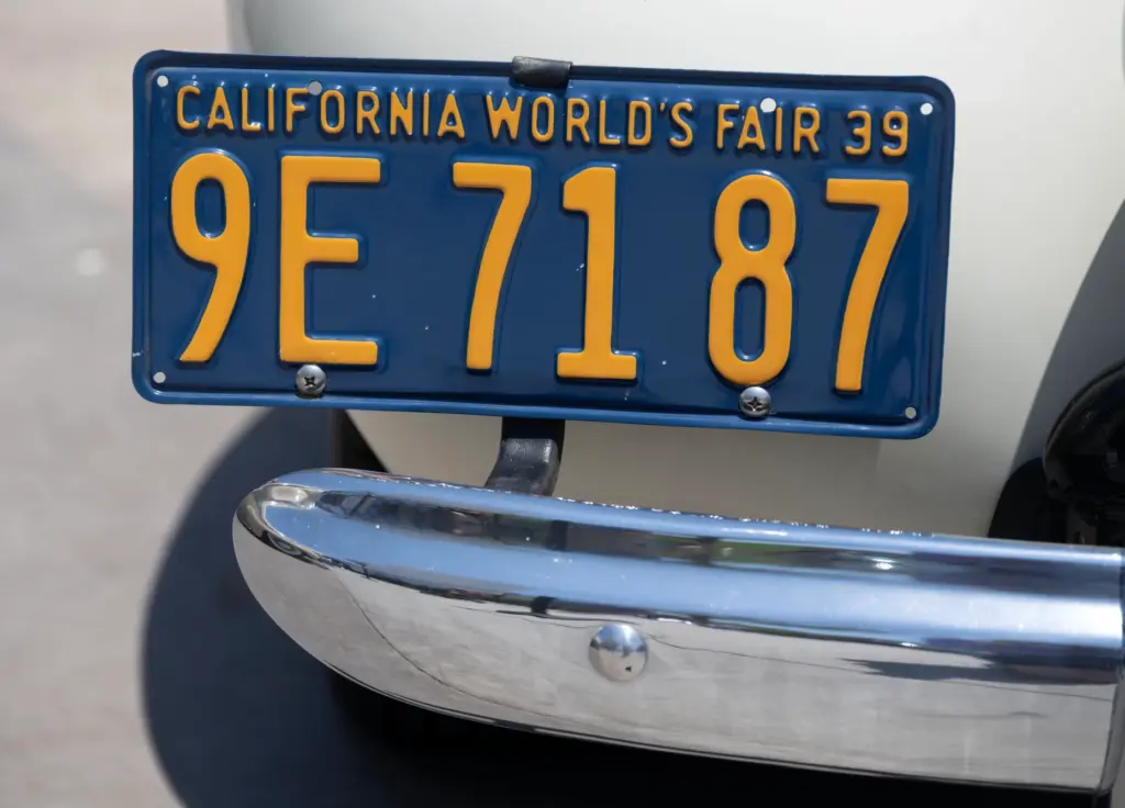 Classic lowrider cars add to the 1940s-era ambience during a...
