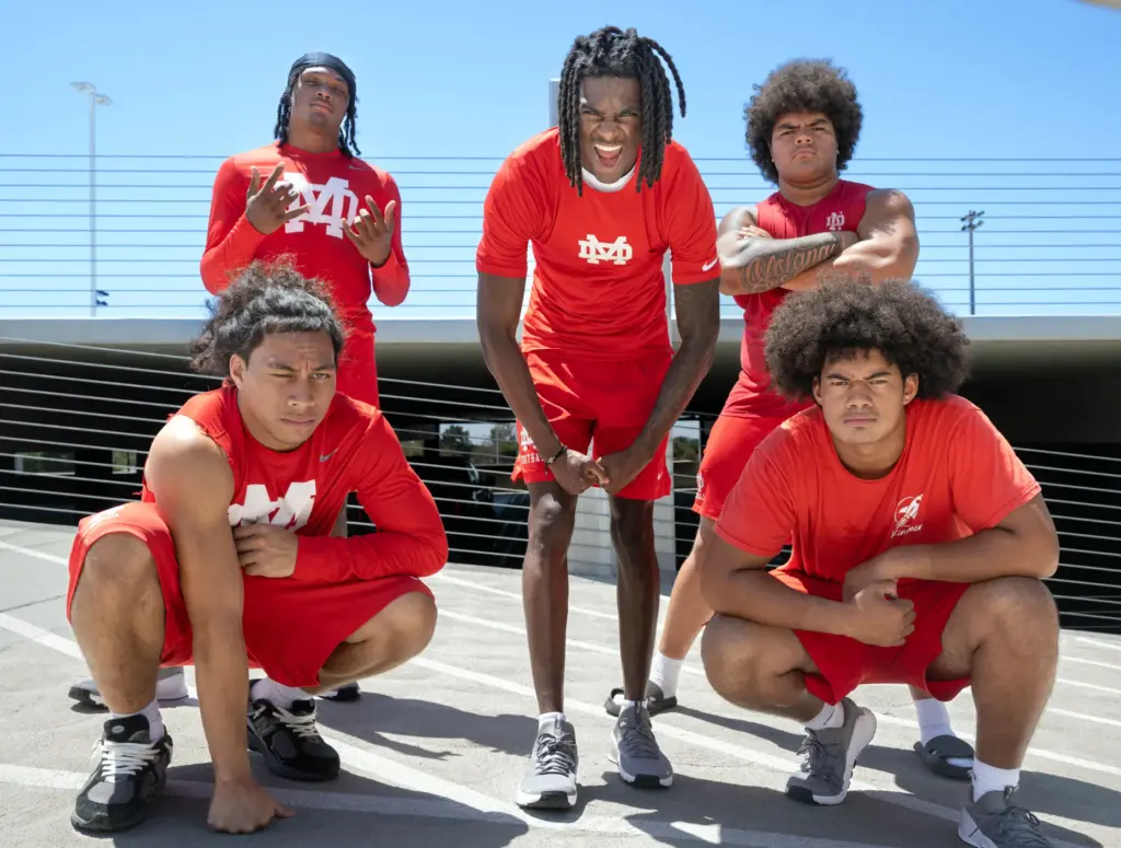 Mater Dei football players, from left, Ezekiel Suâa, DJ Clanton,...