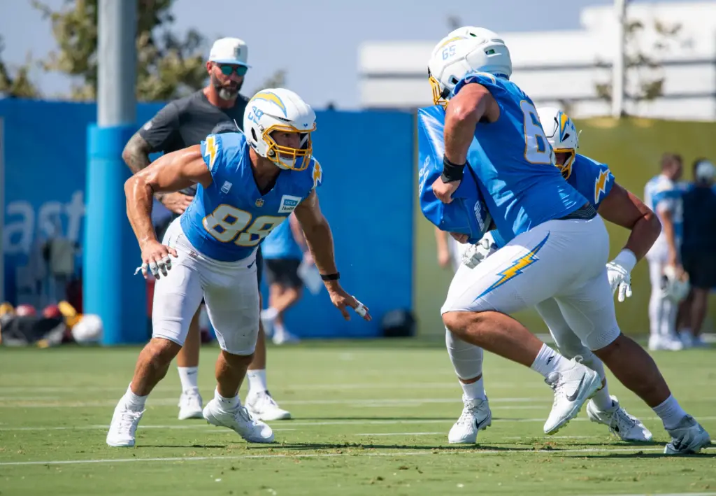 Los Angeles Chargers tight end Charlie Kolar practices blocking during...