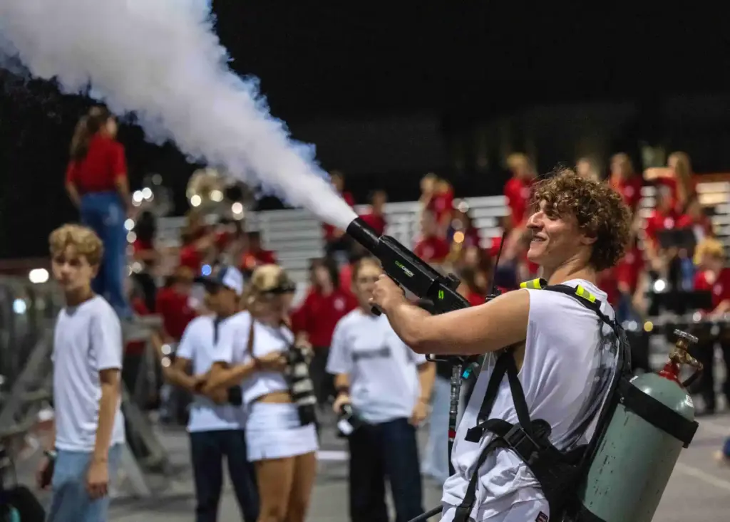 San Clemente student Matthew Nye shoots smoke into the crowd...
