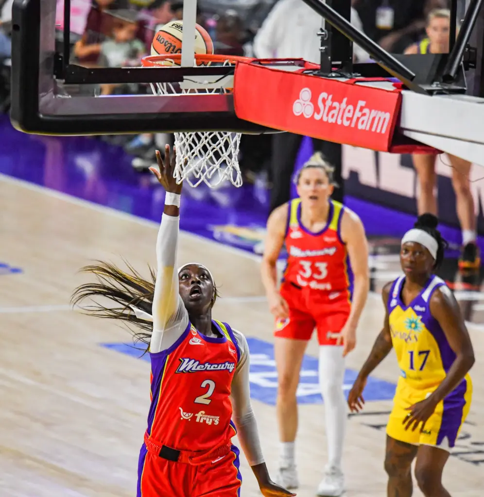 Phoenix Mercury guard Kahleah Copper drops a two-point shot against...
