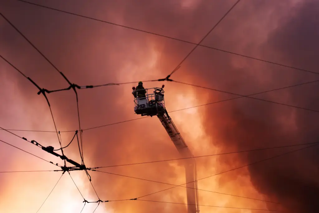 Firefighters try to put out a fire at a city...