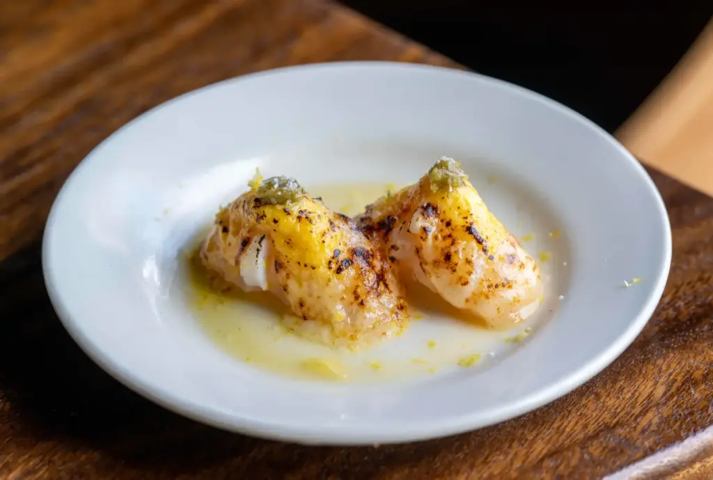 Rocoto Pesca Barâs Hokkaido scallop parmesan features fresh scallops with...