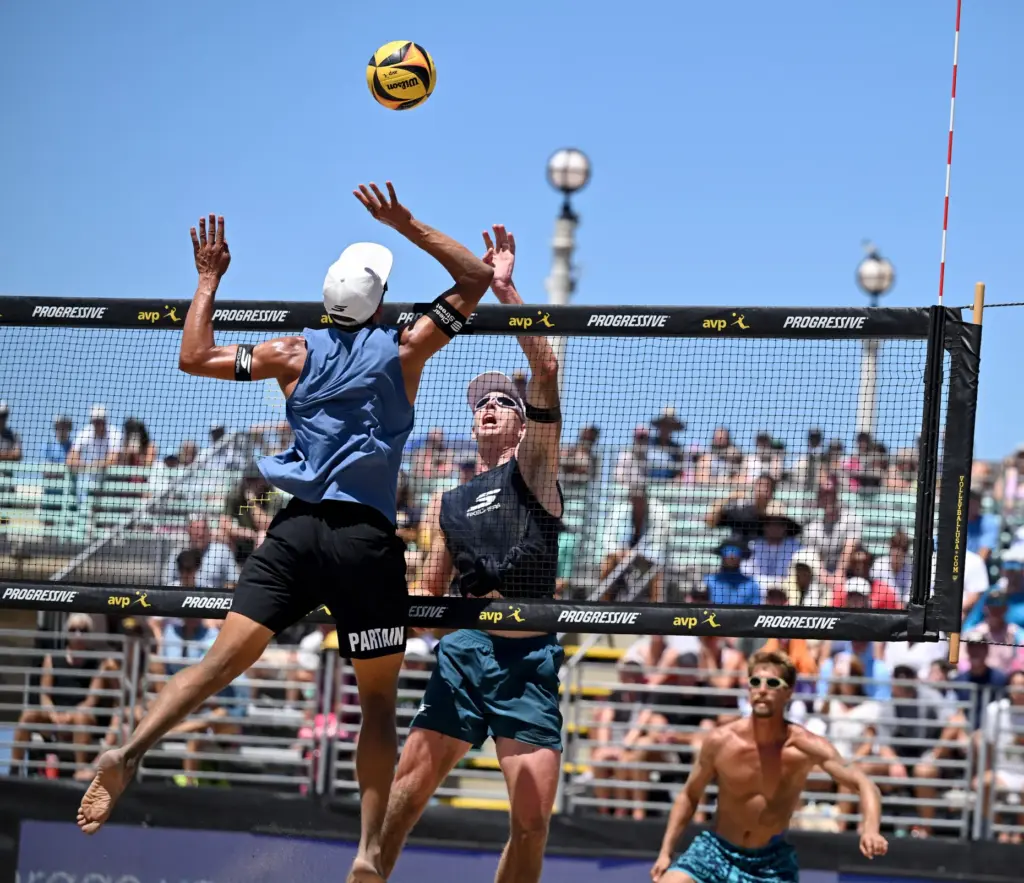 Miles Partain and Paul Lotman play against Taylor Crabb and...