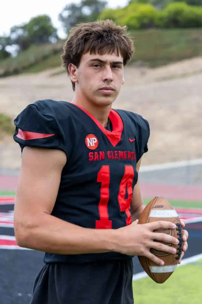 San Clemente wide receiver and safety Jaxon Rex (14) poses...