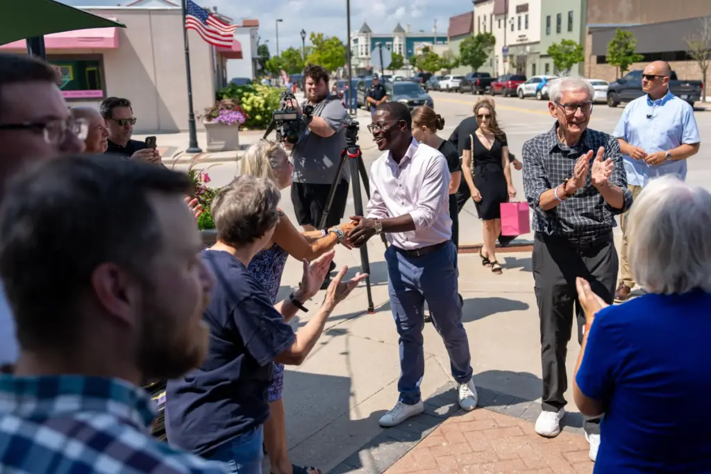 David Crowley, Democratic candidate for Wisconsin governor, shakes hands with...