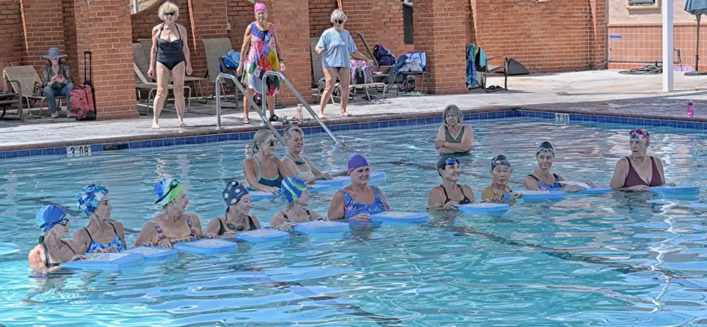 Members of the Laguna Woods Aquadettes line up in the...