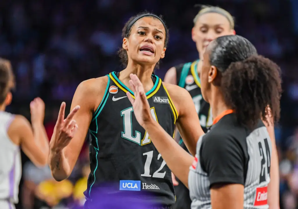 Los Angeles Sparks forward Rae Burrell expresses her frustration during...