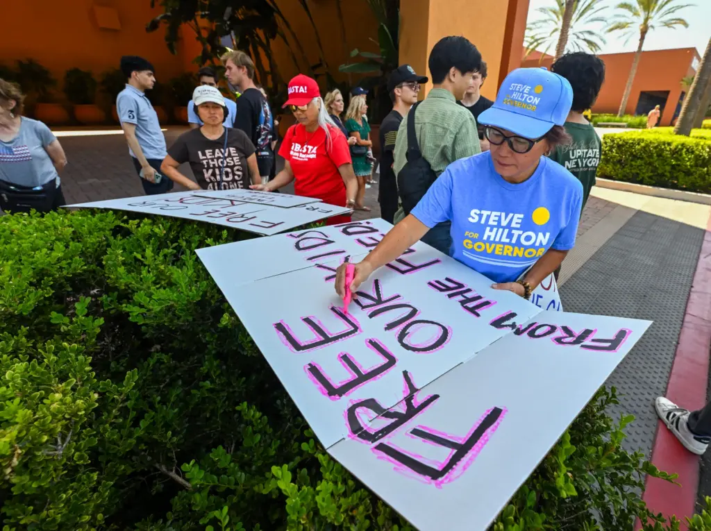 Tam Duong makes a sigh before joining California gubernatorial candidate...