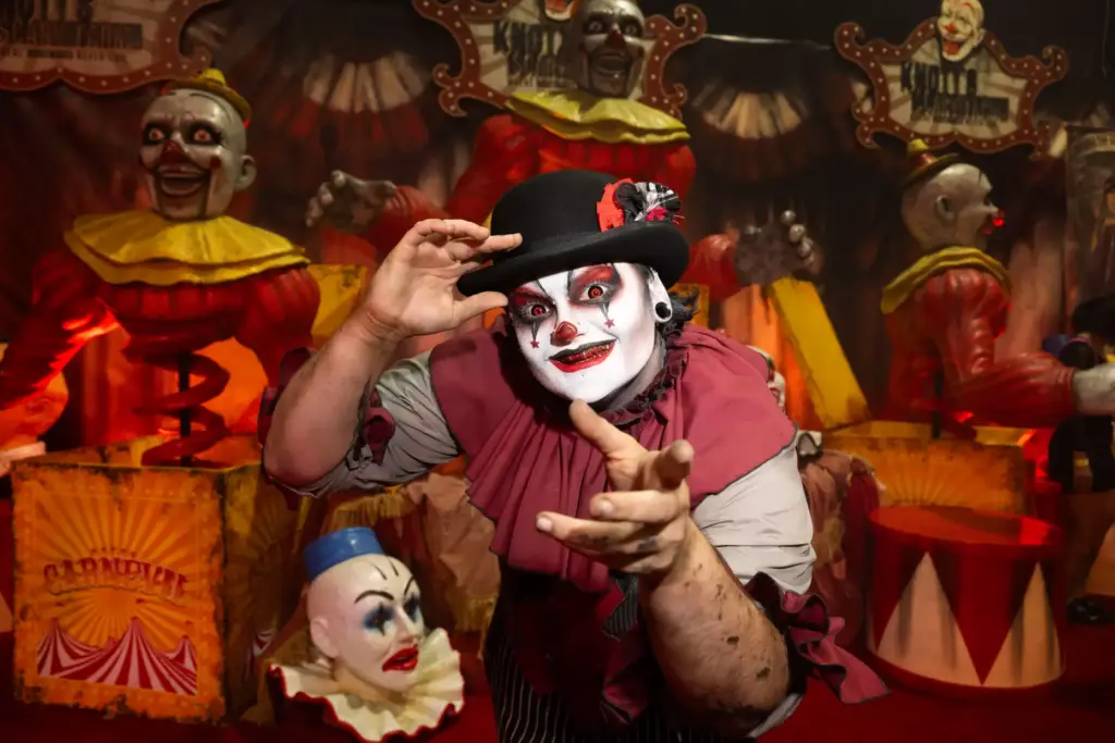 A scary clown entertains horror fans inside the Knottâs Scary...
