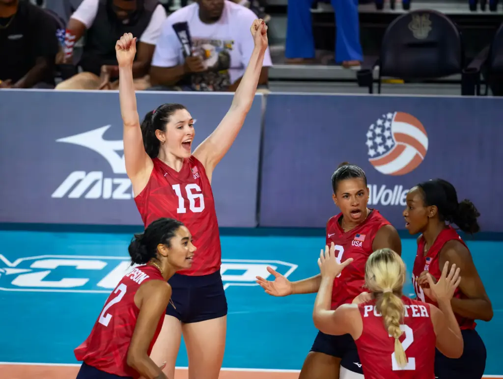 Team USA’s Dana Rettke celebrates a points with teammates during...