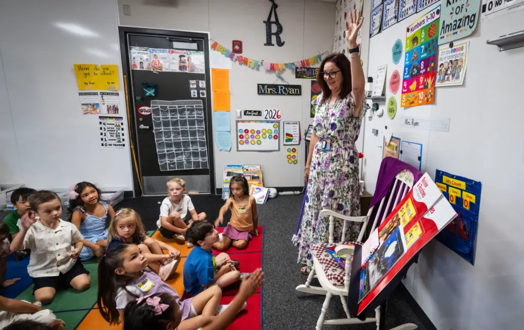 Teacher Barbara Ryan talks to her kindergarten class during the...