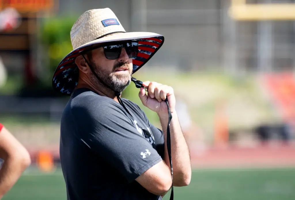 Mission Viejo High School head coach Chad Johnson watches his...
