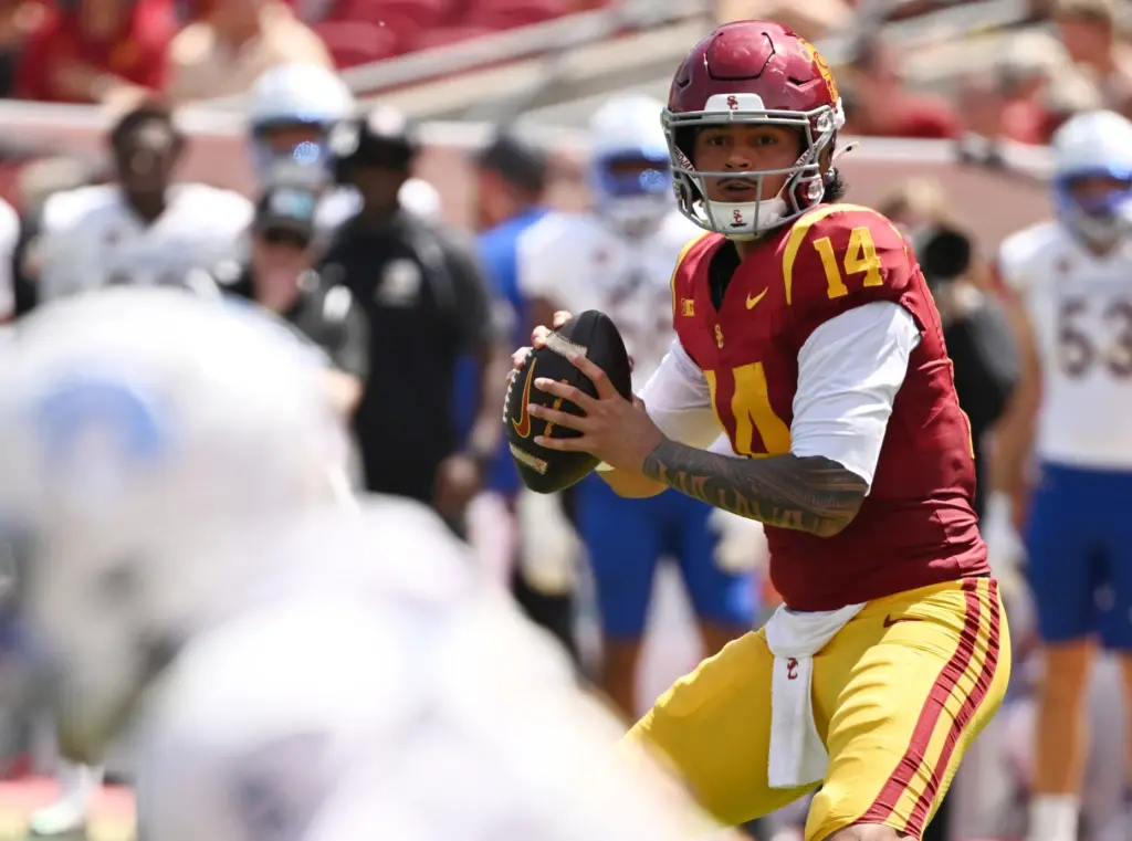 Quarterback Jayden Maiava (14) of the USC Trojans prepares to...