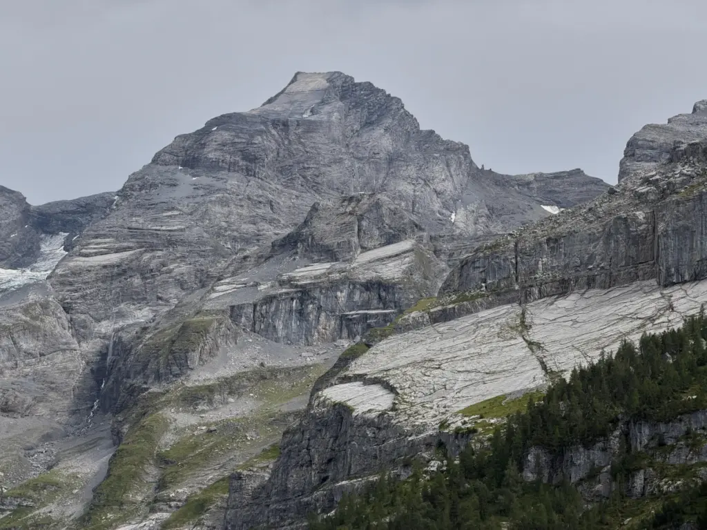 The “Spitze Stei” rock massive with the Bluemlisalphorn peak in...