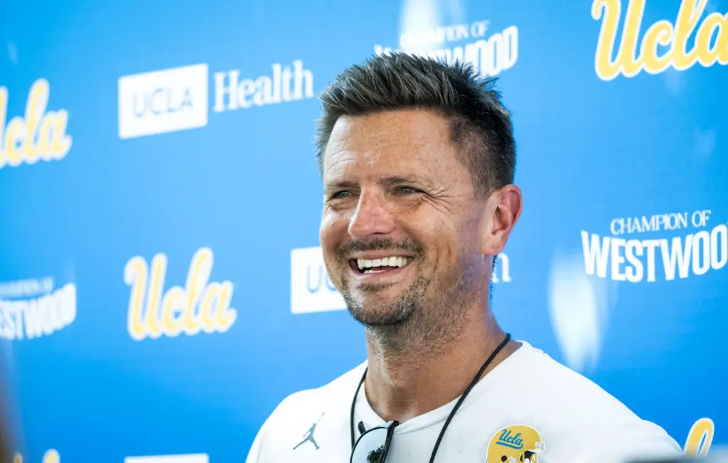 UCLA head coach Bob Chesney talks to the media following...