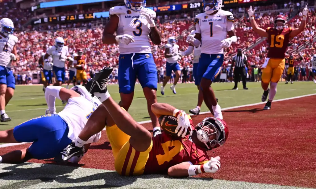 Wide receiver Trent Mosley (4) of the USC Trojans catches...