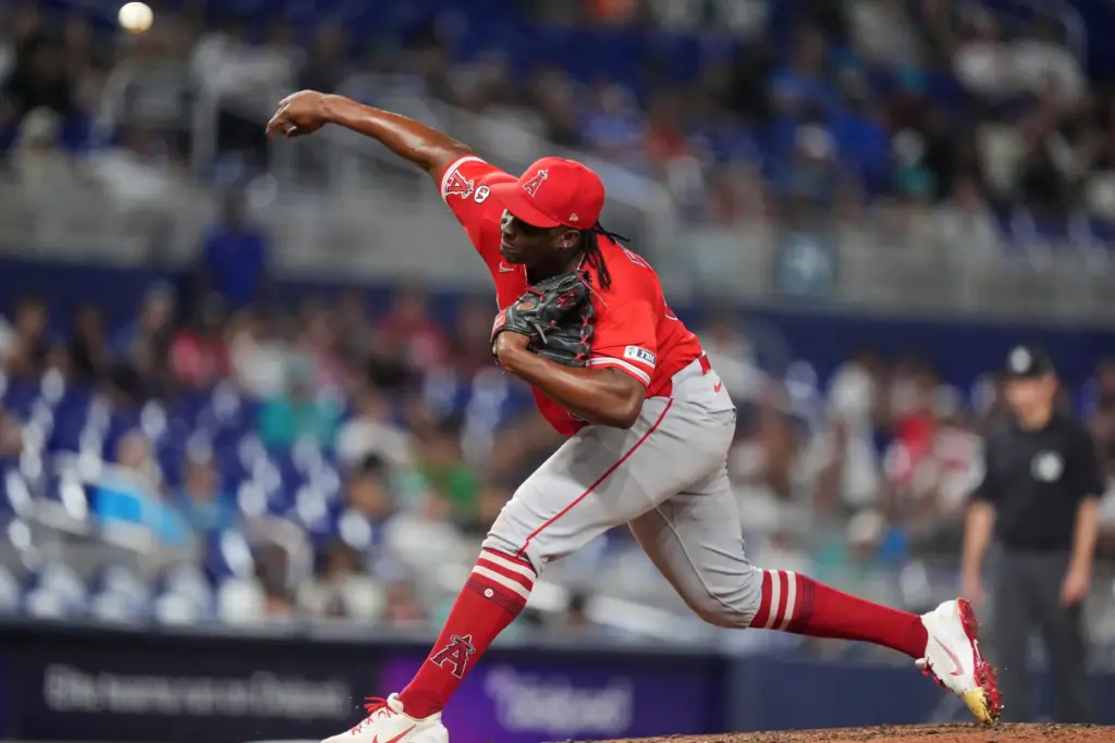Angels relief pitcher Jose Fermin throws to the plate during...