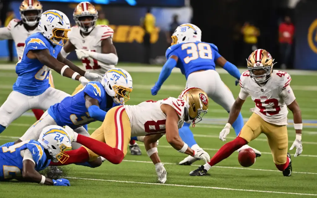 San Francisco 49ers wide receiver Junior Bergen (86) recovers a...