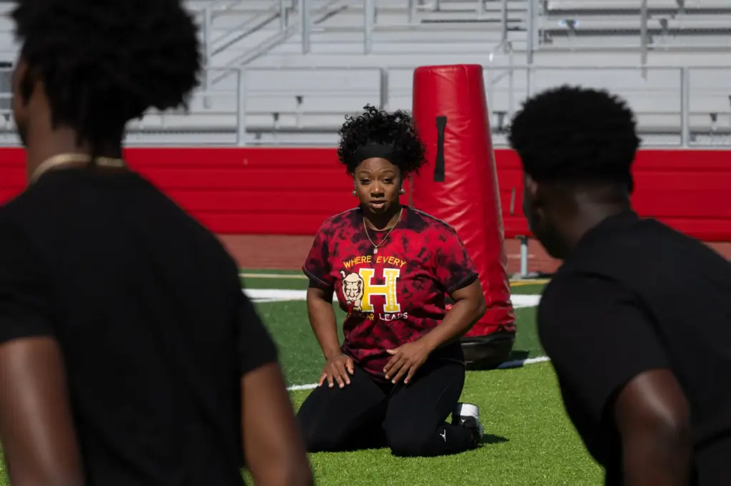 Head Coach Jazmin Gamble leads practice at Hawthorne High School...