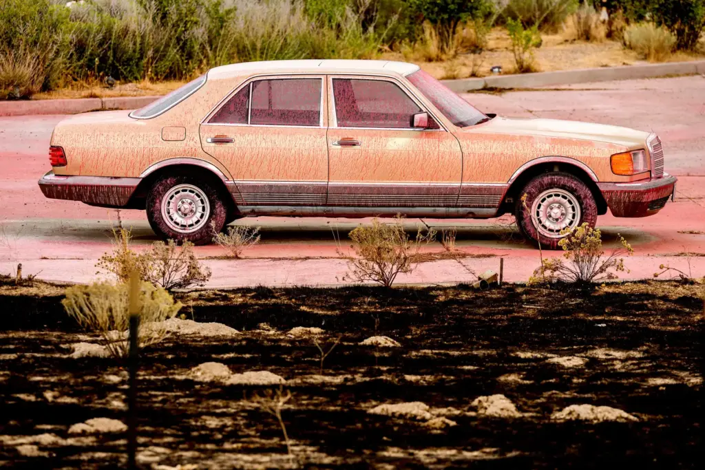 Fire retardant coats a vehicle following the Bug Fire near...