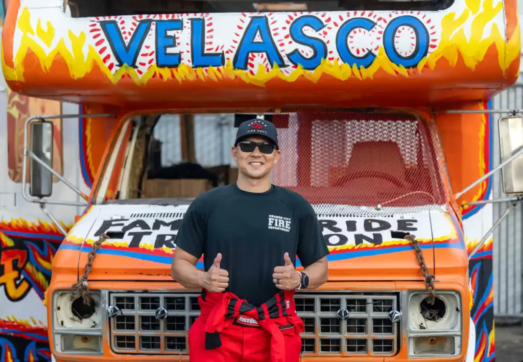 Orange Fire Chief Alan Velasco stands in front of his...