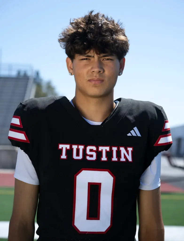 Tustin High School football player Hayden Koo (0) on Monday,...