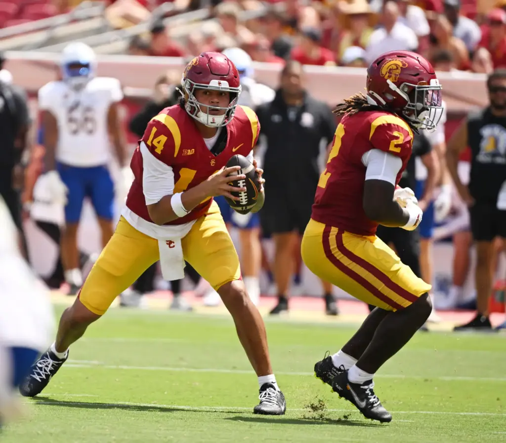 Quarterback Jayden Maiava (14) of the USC Trojans prepares to...